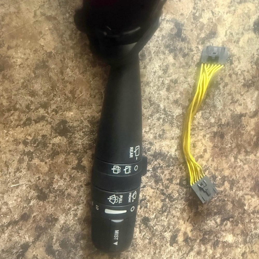 Black Car Turn Signal Lever with Yellow Wiring